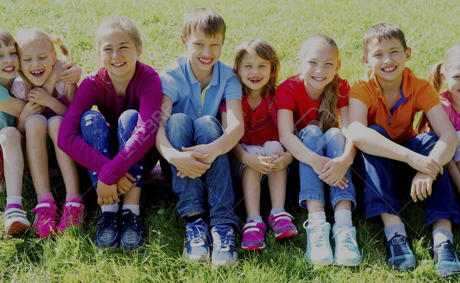 Group of kids playing outside in a park